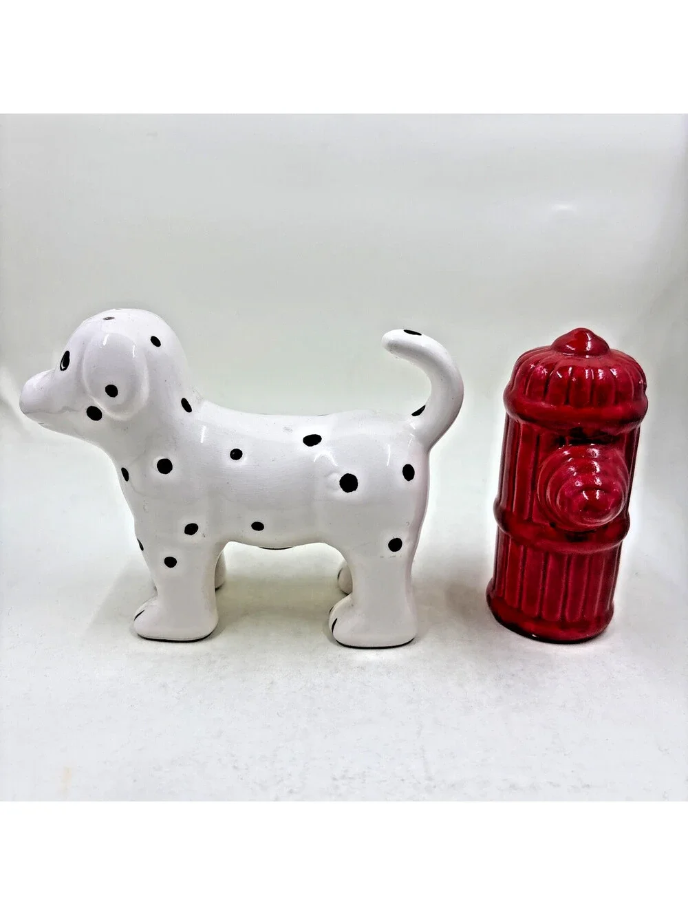 Ceramic Dalmatian dog and fire hydrant ceramic salt & pepper shaker set